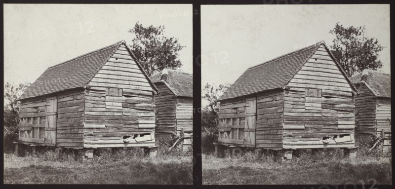Timber barn on brick stilts, Sussex, 1913. Creator: Walter Edward Zehetmayr.