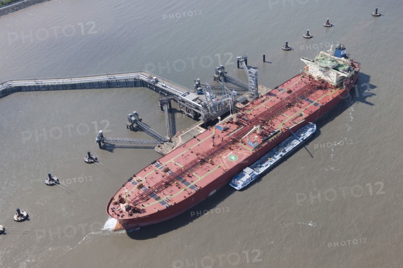 A ship moored up at floating stage on the River Mersey at Tranmere Oil Terminal, Wirral, 2015. Creator: Historic England.