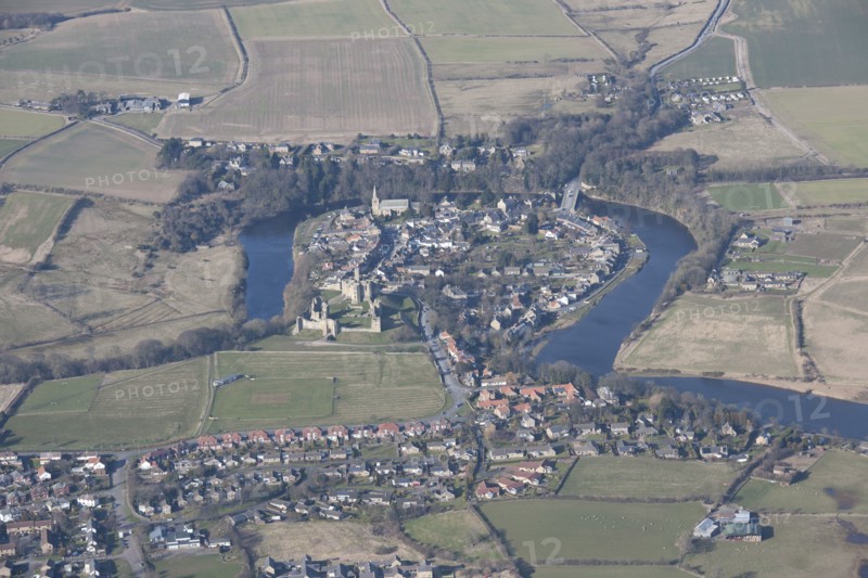 Village of Warkworth, situated in a loop of the River Coquet, Northumberland, 2015. Creator: Historic England.