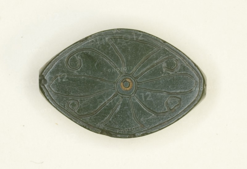 Cowroid: Floral Motif, Egypt, New Kingdom, Dynasty 18 (1550-1069 BCE). Creator: Unknown.
