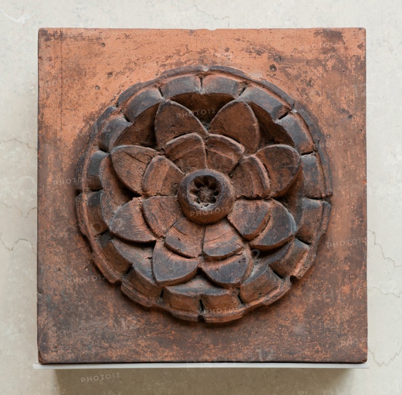Raymond, E.G., Store and Flats: Rosette Fragment from Facade, 1884. Creator: Treat & Foltz.