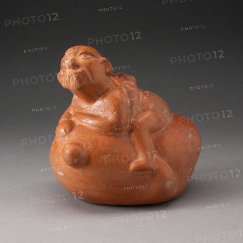 Stirrup Spout Vessel in Form of a Man Sitting atop a Vegetable, 100 B.C./A.D. 500. Creator: Unknown.