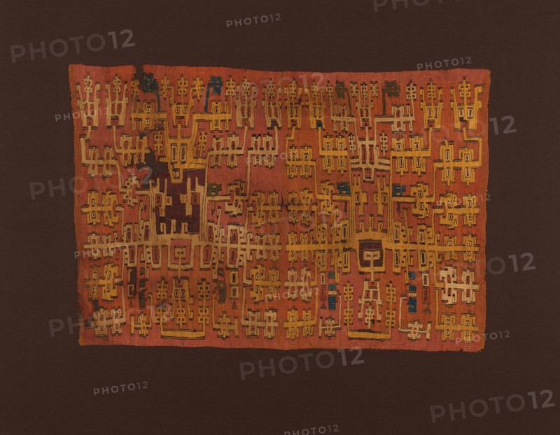 Panel, Peru, Possibly 500/600. Abstract anthropomorphic beings (possibly deities) wearing ornate whiskered feline masks, headdresses, and ear ornaments.