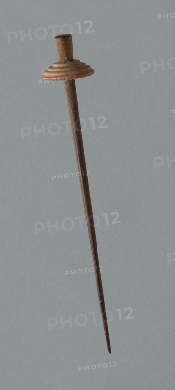 Wooden Spindle with Ceramic Whorl, Peru, 1000/1476.