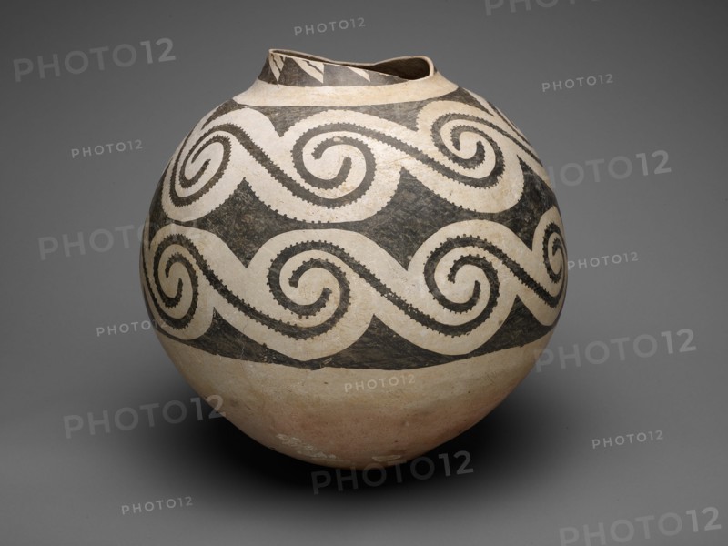 Storage Jar with Horizontal Bands of Interlocking Scrolls, A.D. 875/1130. Round ceramic jar with large black S-shaped geometric designs on cream ground.