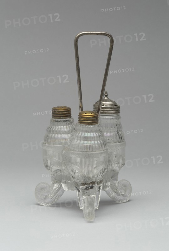 Jumbo/Elephant pattern cruet stand with three bottles, 1883/5. Attributed to Canton Glass Company.