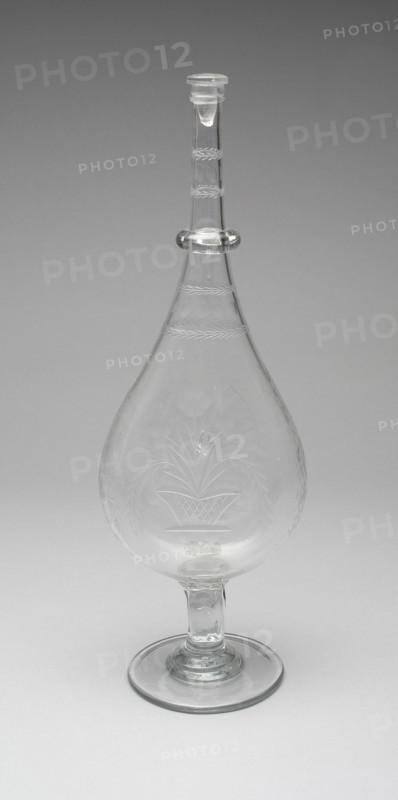 Bottle, 1850/60. Engraved floral decoration. Attributed to the New England Glass Company.