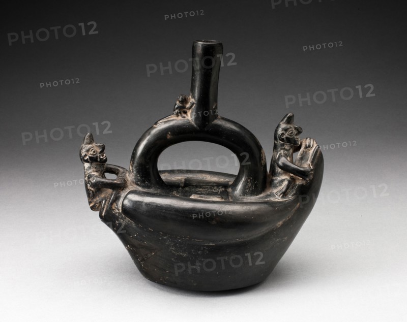Single Spout Blackware Vessel in the Form of Figures Riding on Reed Boat, A.D. 1000/1400.