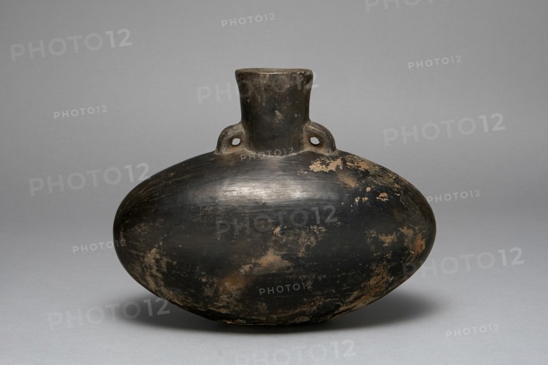 Blackware Jar with Single Spout, A.D. 1200/1450. A squat oval-shaped ceramic jar, painted black, with a cylindrical top and two very small handles on either side of the top. Some visible paint loss.