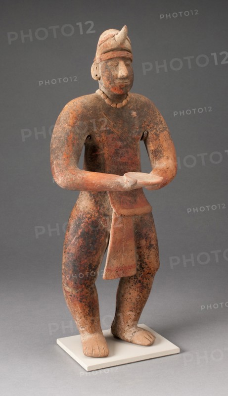 Standing Male Figure Holding a Plate, A.D. 100/400.
