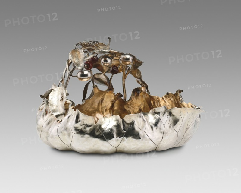 Berry Bowl, 1885/95. Decorative silverware, handle formed of entwined branches and leaves, plums and copper cherries, with a fly, a beetle, and a spider. Design attributed to George W. Shiebler, made by Shiebler, or George W. Shiebler and Company.