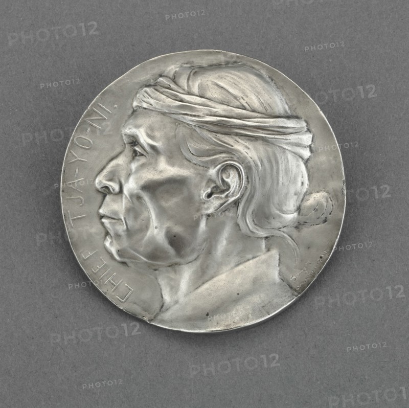 Chief Chief Tja-Yo-Ni, 1904. Profile medallion of a Native American man.