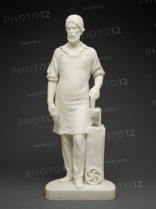 Machinist, c. 1859. White marble statue of machinist with hammer, anvil, and cogs.