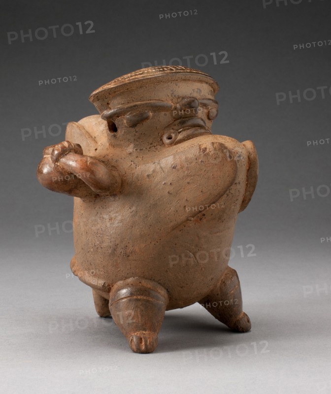 Vessel in the Form of a Hunchback Figure Carrying a Jar, A.D. 1200/1500.
