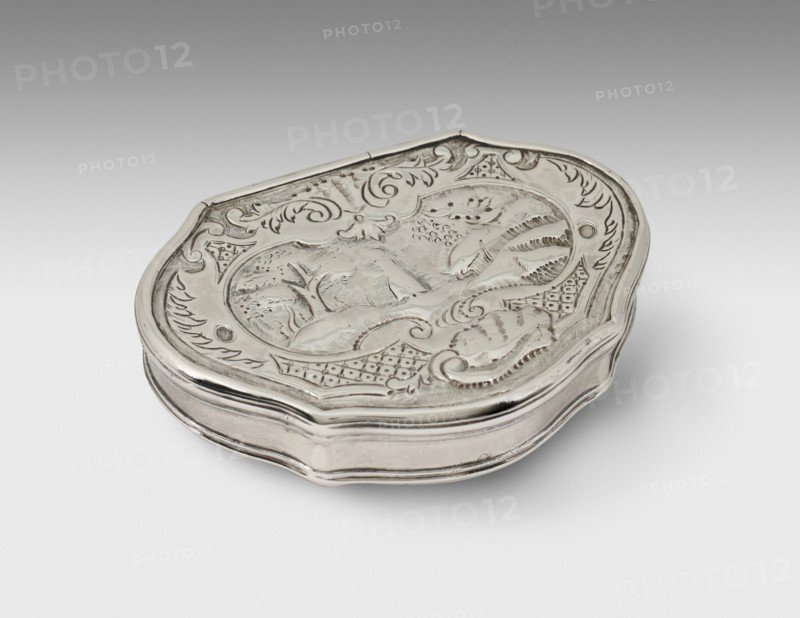 Snuff Box, 1752. Stylised foliage decoration with landscape scene.