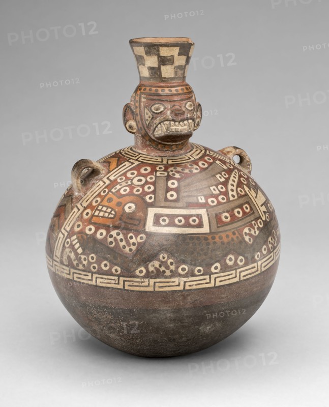 Bottle with a Masked Figure and Abstract Feline and Textile Motifs, A.D. 700/900.