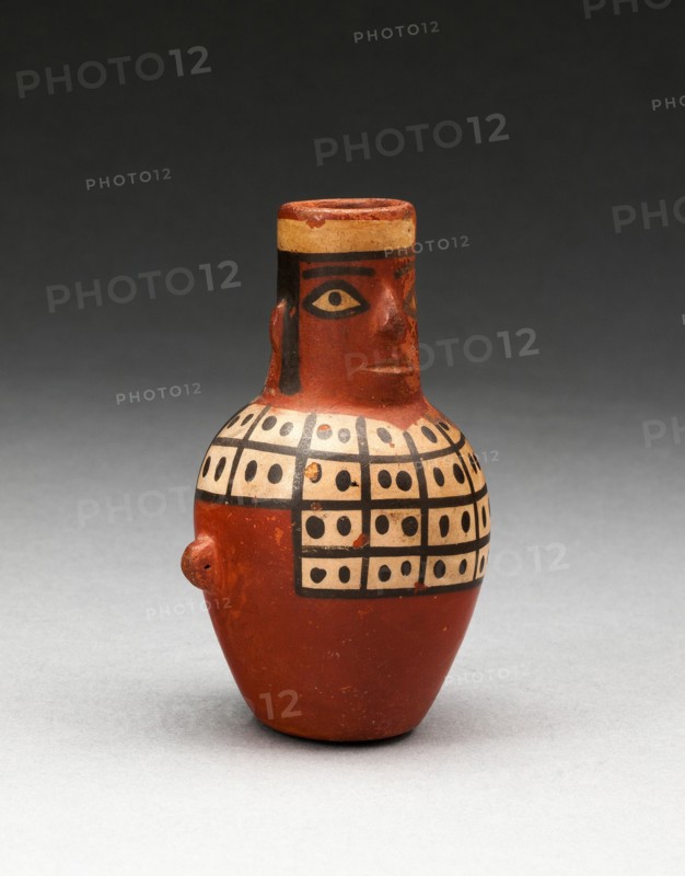 Miniature Jar in the Form of a Figure Wearing a Tunic, A.D. 600/1000.