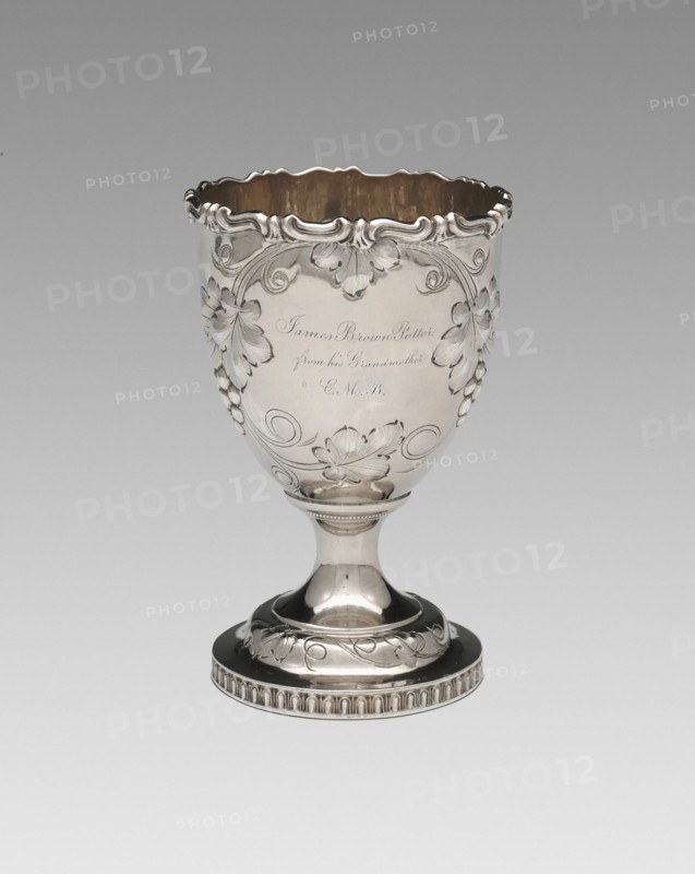 Goblet, 1852. Relief decoration of grapes and vine leaves, inscribed: 'James Brown Potter, from his Grandmother E.M.B.'.