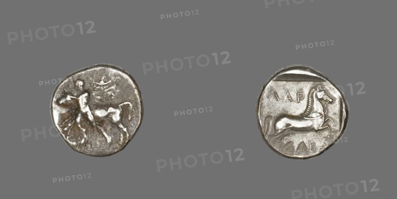 Drachm (Coin) Depicting Thessalos Holding a Bull, 435-400 BCE.