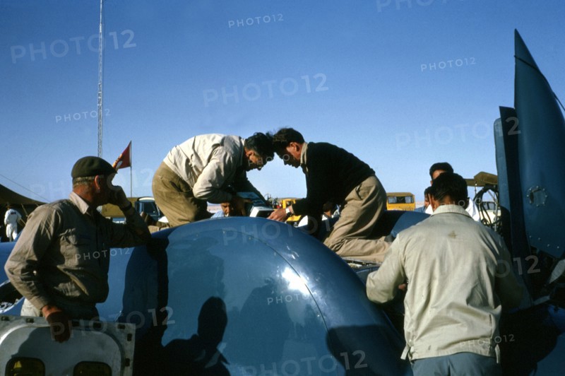 Mechanics working on Bluebird CN7 for World Land speed record attempt, Lake Eyre, 1964. Creator: Unknown.
