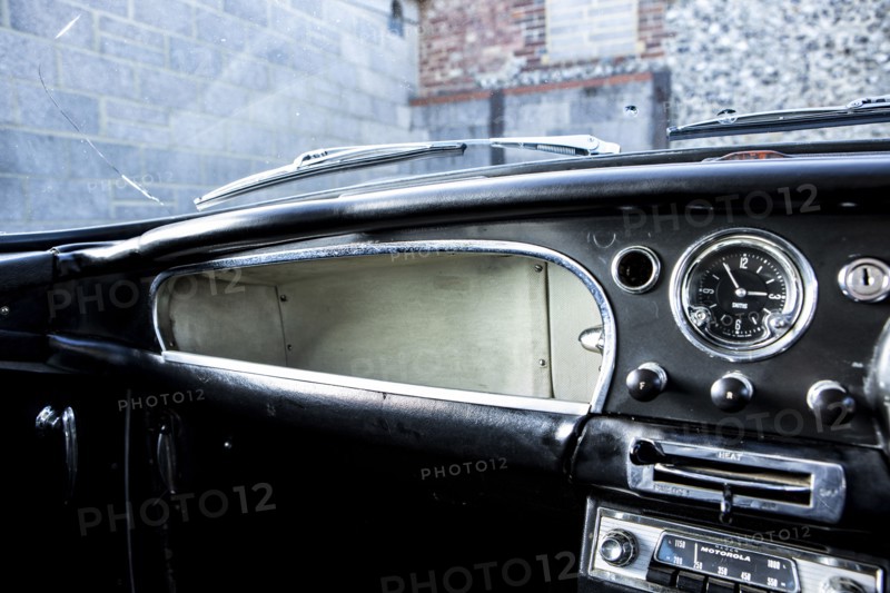 Glove compartment of a 1961 Aston Martin DB4 GT SWB lightweight. Creator: Unknown.