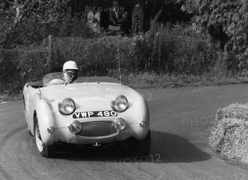 C Wells driving an Austin Healey Frogeye Sprite at the Wiscombe Park Hill, Climb, Devon, 1961. Creator: Unknown.