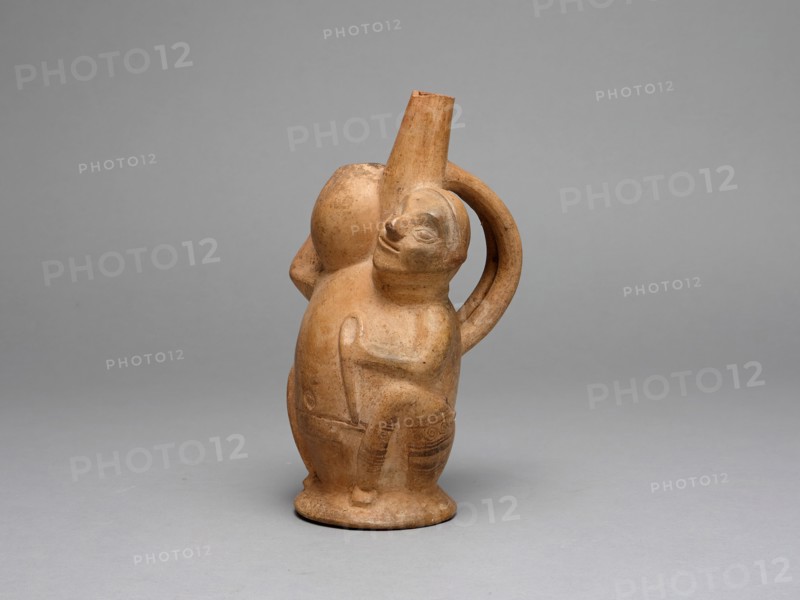 Handle Spout Vessel in the Form of a Seated Man Carrying a Jar, A.D. 700/1000. Creator: Unknown.