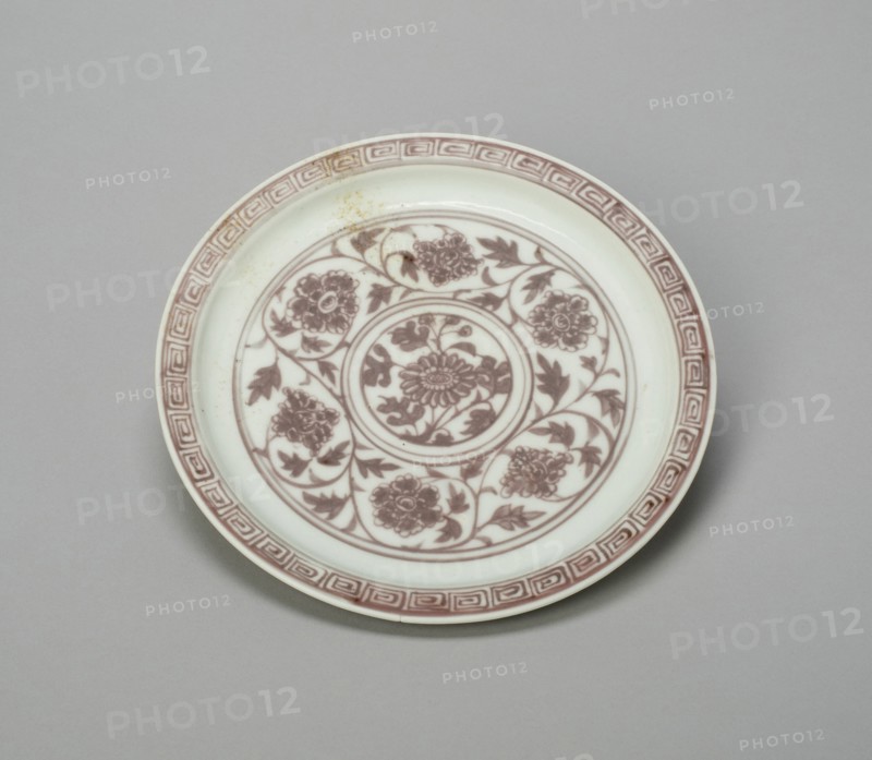 Shallow Dish with Peony Scrolls, Chrysanthemum Sprays, and Key-Fret Border; Lotus Panels Panels Under Rim, Ming dynasty (1368-1644), Hongwu period (1368-1388).