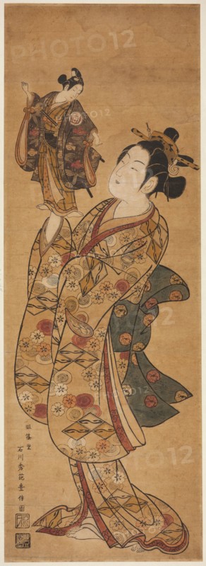 The Actor Onoe Kikugoro I holding a puppet of the Actor Sanogawa Ichimatsu I, c. 1740s.