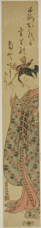 The Actor Segawa Kikunojo II as a woman holding a hairpin, c. 1760.