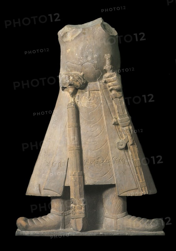 Statue of the emperor Kanishka with inscriptions in Brahmi Script, 1st-2nd century. Creator: Central Asian Art.