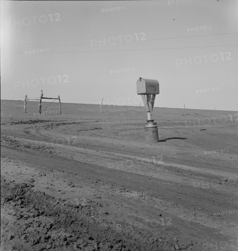 Mailbox in Dust Bowl, Coldwater District, north of Dalhart, Texas, 1938. Creator: Dorothea Lange.