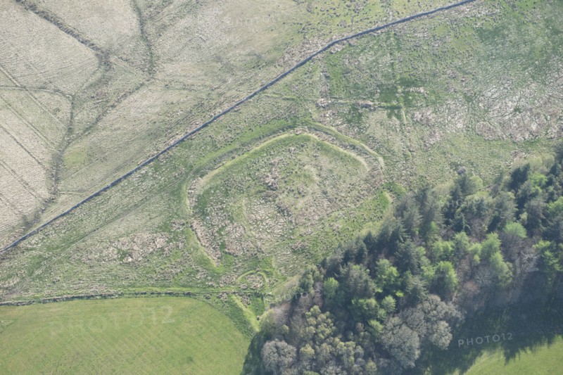 Iron Age/Romano British enclosed settlement earthwork near Smalesmouth Farm, Northumberland, 2016. Creator: Dave MacLeod.