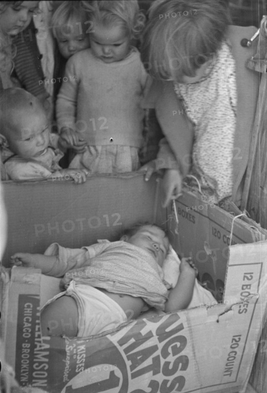 Children of migrant families in the nursery school, Kern migrant camp, California, 1936. Creator: Dorothea Lange.