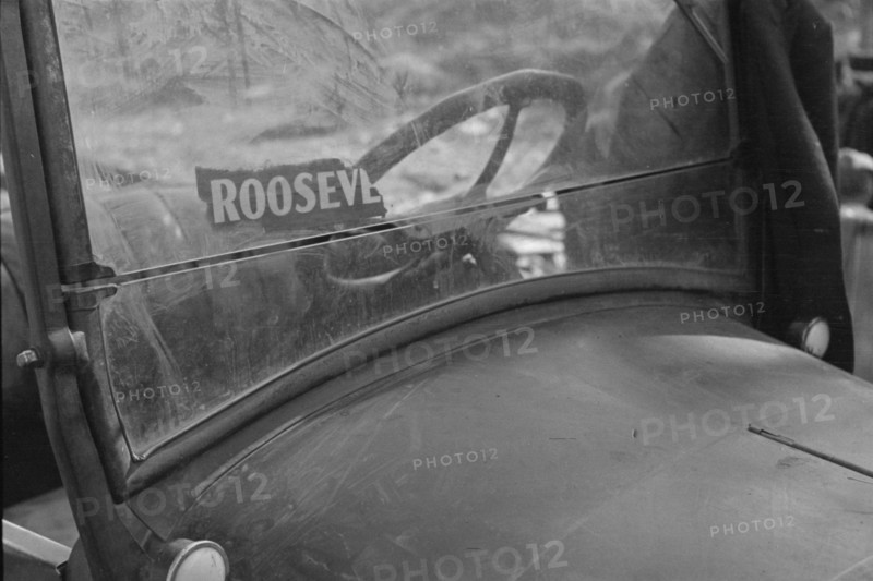 The windshield of a migratory agricultural laborer's car, Sacramento, California, 1936. Creator: Dorothea Lange.