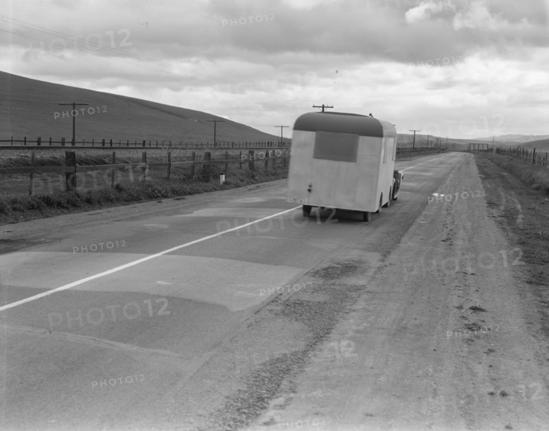 Note on "mobile housing" - Car and homemade trailer on U.S. 101 near King City, 1936. Creator: Dorothea Lange.