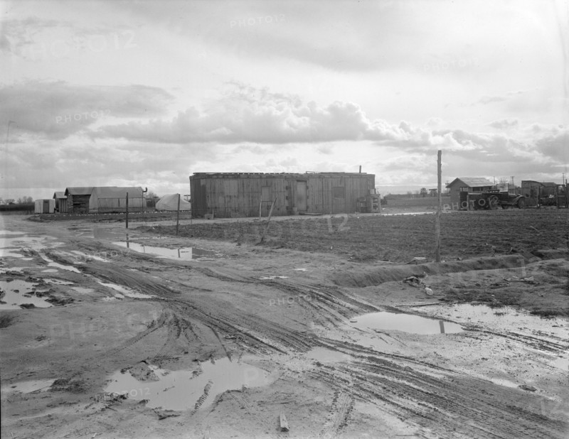 Freightcar converted into home in "Little Oklahoma", California, 1936. Creator: Dorothea Lange.
