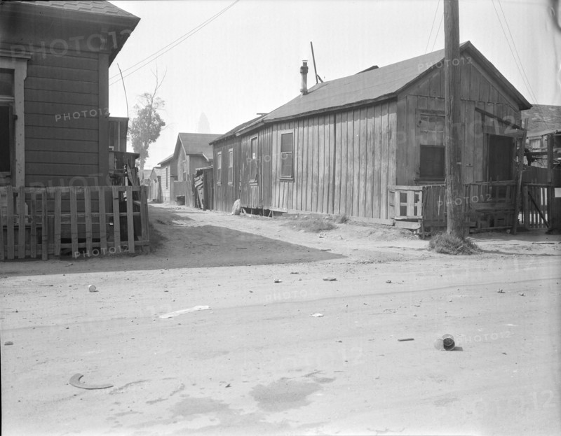 Mexican quarter of Los Angeles, one quarter mile from City Hall, California, 1936. Creator: Dorothea Lange.