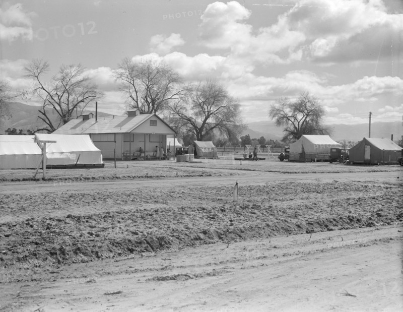 Kern County camp for migrants, fifteen miles out of Bakersfield, California, 1936. Creator: Dorothea Lange.