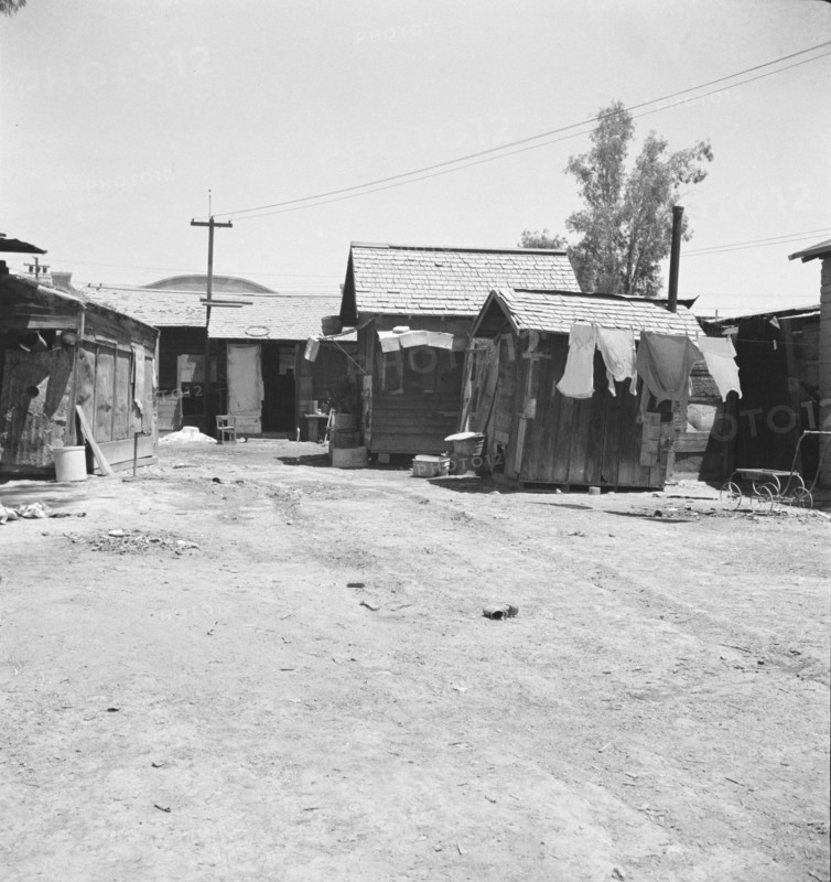 Homes of Mexican field workers, Brawley, Imperial Valley, California, 1935. Creator: Dorothea Lange.