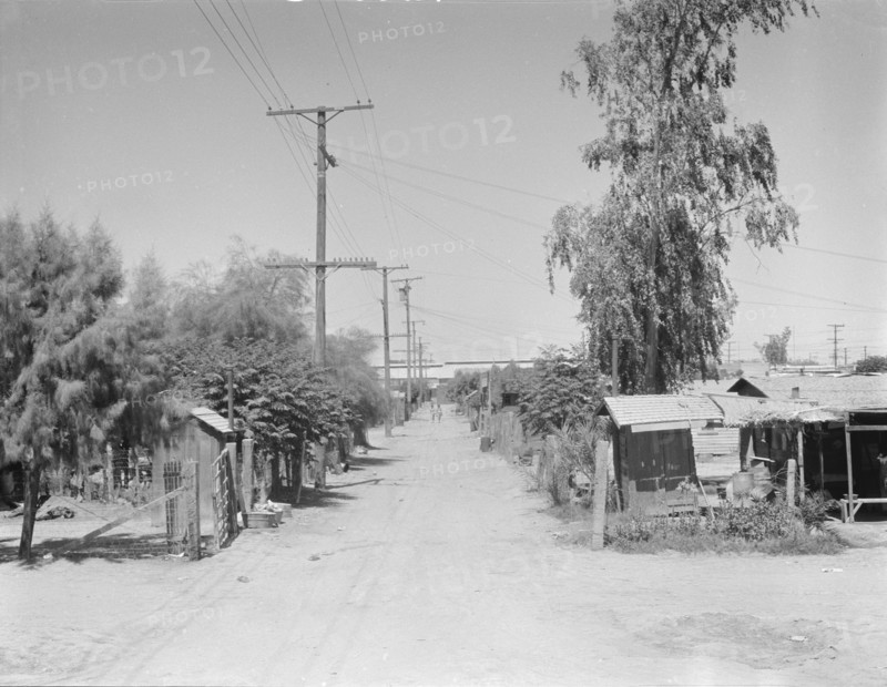 Slums of Brawley, Mexican field workers' homes, Imperial Valley, California, 1936. Creator: Dorothea Lange.