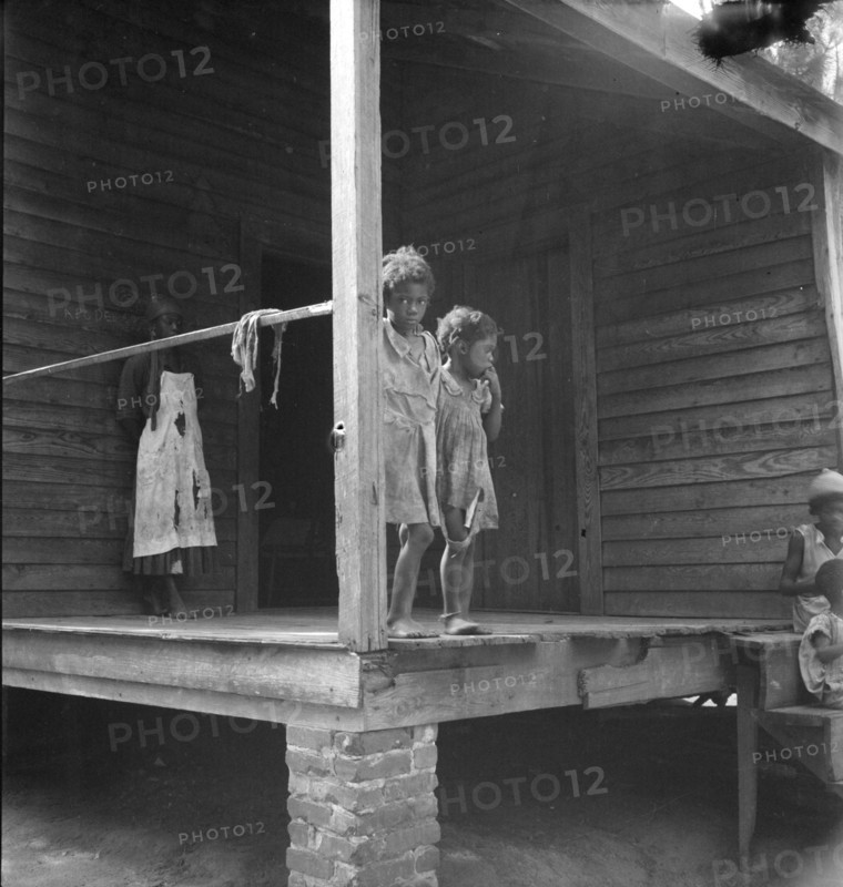 Children of turpentine worker near Cordele, Alabama, 1936. Creator: Dorothea Lange.