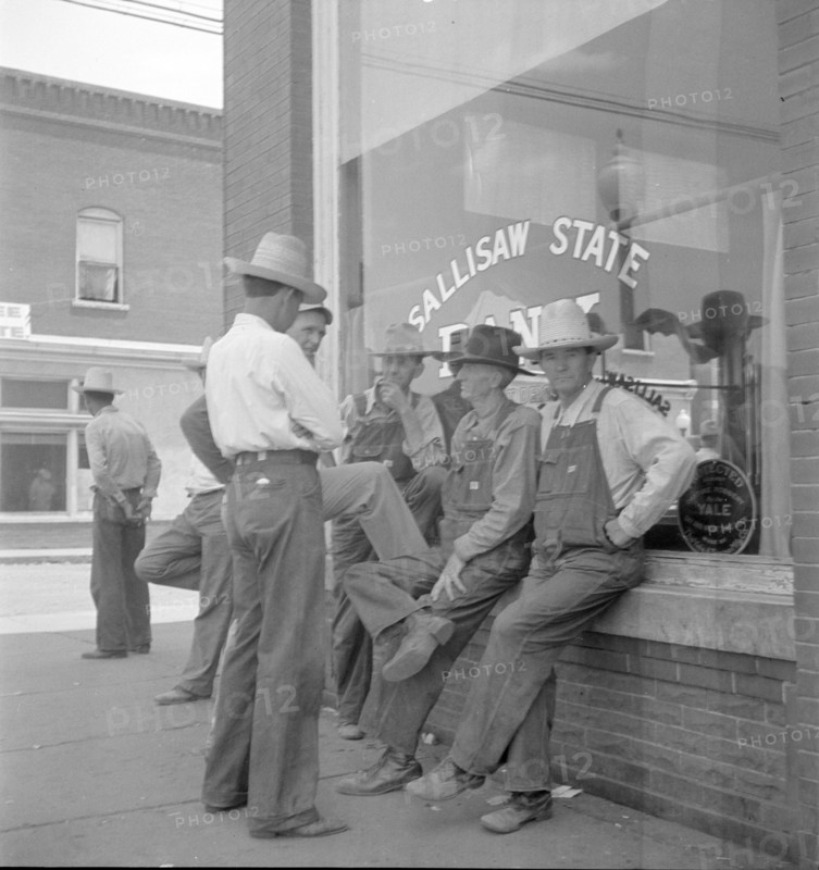 Farmers, Main street in Oklahoma town - Drought region, 1936. Creator: Dorothea Lange.