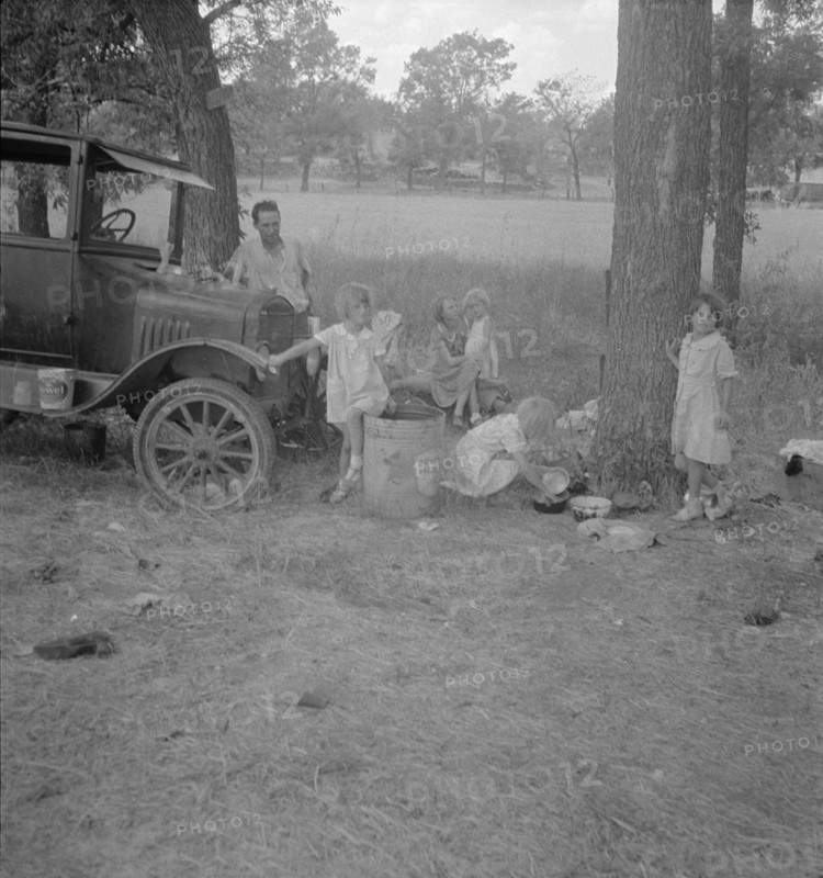 Migrant family from Oklahoma in Texas, 1936. Creator: Dorothea Lange.
