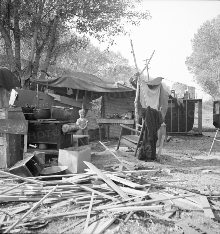 Destitute family, American River camp, Sacramento, California., 1936. Creator: Dorothea Lange.