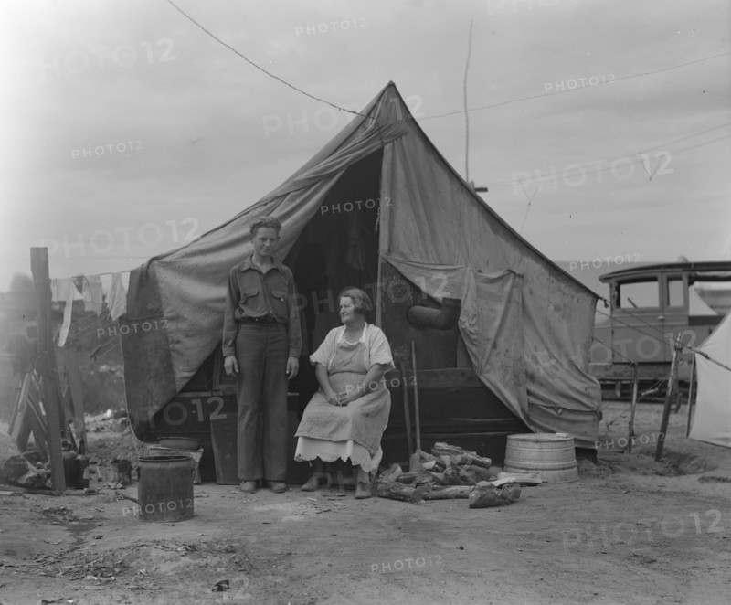 Part of migrant family of five encamped near Porterville, CA, 1936. Creator: Dorothea Lange.