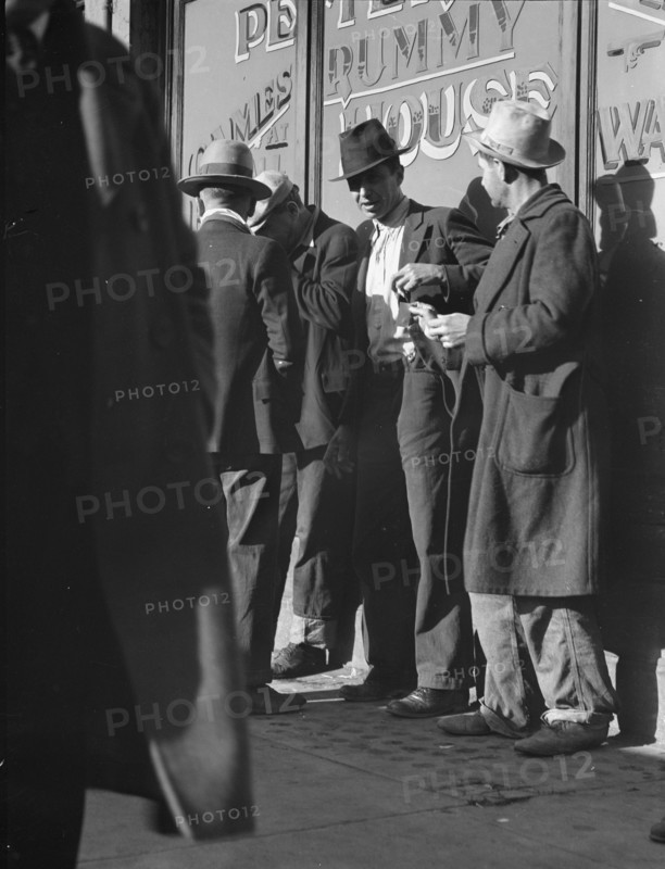 Unemployed men on Howard Street, San Francisco, California, 1937. Creator: Dorothea Lange.