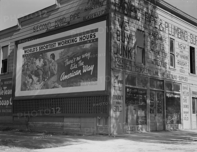 Billboard on U.S. Highway 99 in California, 1937. Creator: Dorothea Lange.