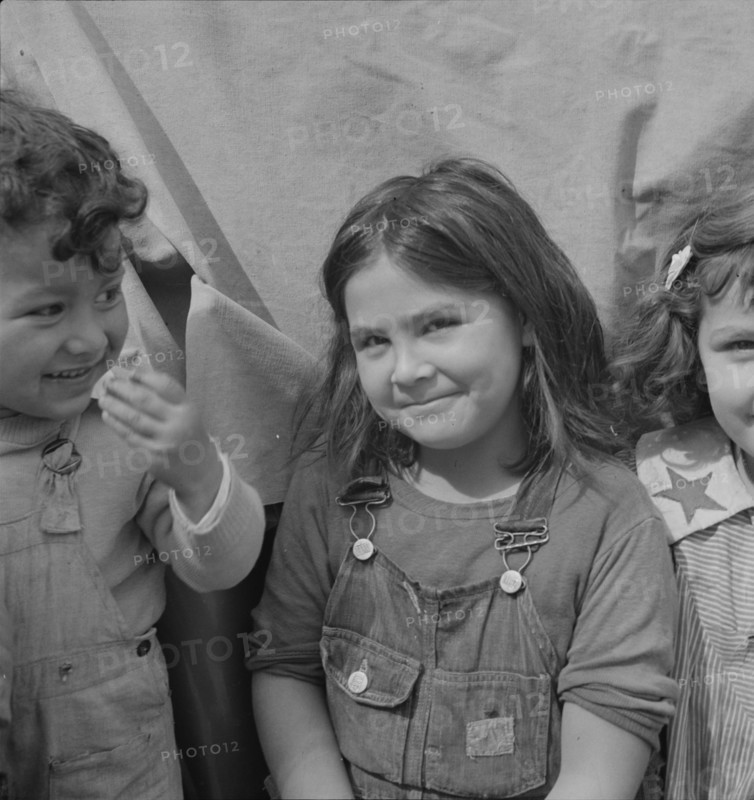 Children of migratory carrot pullers, Mexicans, Imperial Valley, California, 1937. Creator: Dorothea Lange.