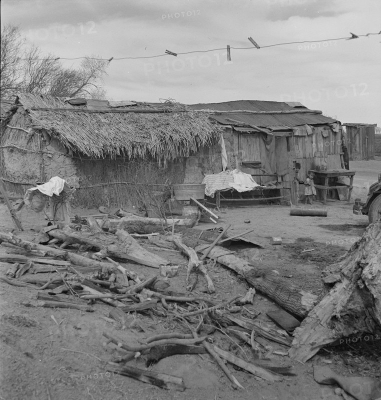 Ditch bank housing for Mexican field workers, Imperial Valley, California, 1937. Creator: Dorothea Lange.